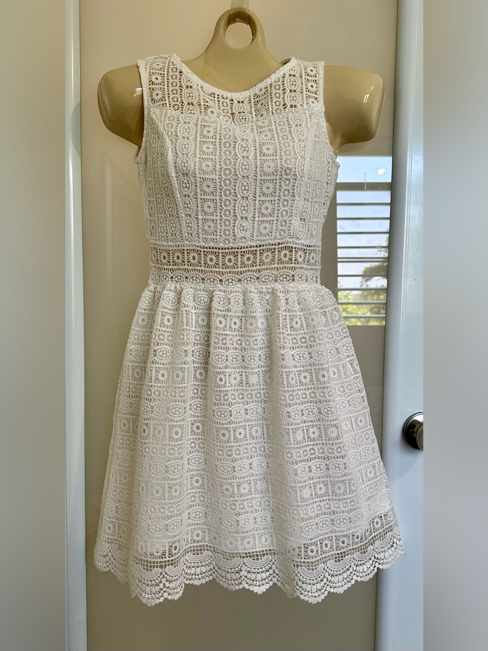 Sleeveless White Lace Mini Dress with Scalloped Hem